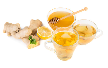 Ginger tea and ingredients isolated on white backgroundの写真素材
