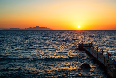Red Sea in Egypt during sunrise with blue water and pierの写真素材