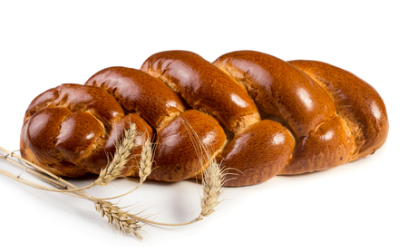 Sweet bread plait isolated on white backgroundの写真素材