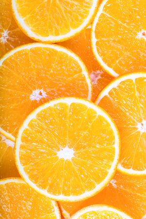 Background made from orange slicesの写真素材