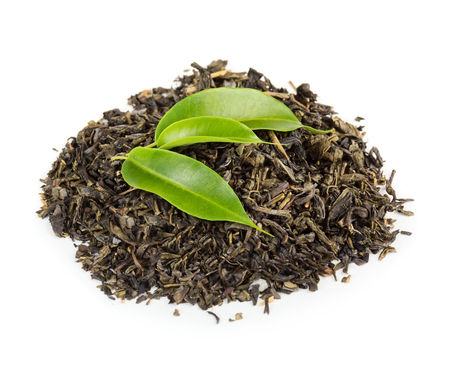 Green and black tea leaves isolated on white backgroundの写真素材