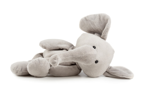 Grey adorable toy elephant isolated on white backgroundの写真素材