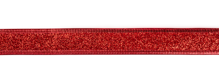 Red ribbon with glitter isolated on white backgroundの写真素材