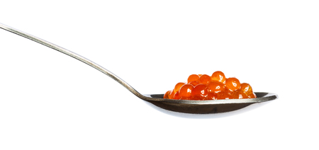 Red caviar in the silver spoon isolated on a white backgroundの写真素材