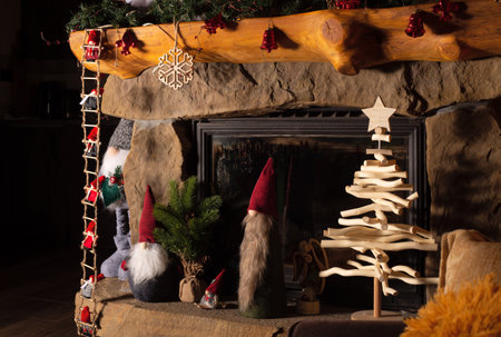 interior christmas. Fireplace with gifts and new year decorationsの写真素材