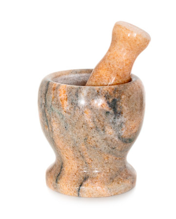 Mortar and pestle made from pink granite isolated on white backgroundの写真素材