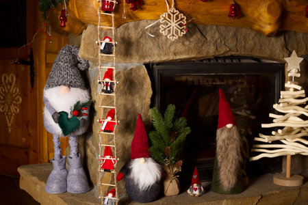 interior christmas. Fireplace with gifts and new year decorationsの写真素材