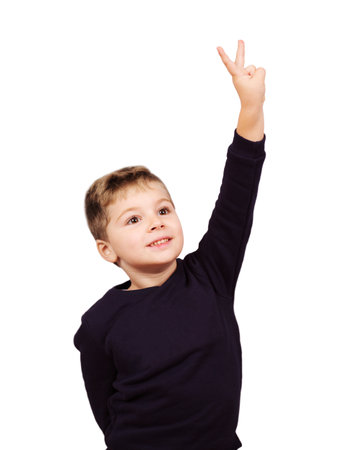 Little Boy make victory sign isolated on white backgroundの写真素材
