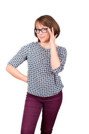 Portrait of young beautiful business woman in glasses isolated on white backgroundの写真素材