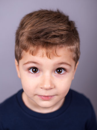 Cute little boy surprisedの写真素材