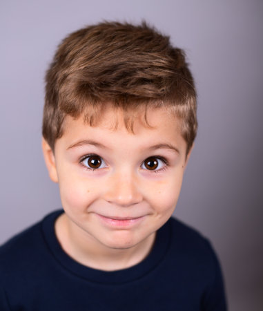 Cute little boy surprisedの写真素材