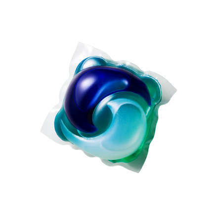 Washing gel capsule pod with laundry detergent isolated on white backgroundの写真素材
