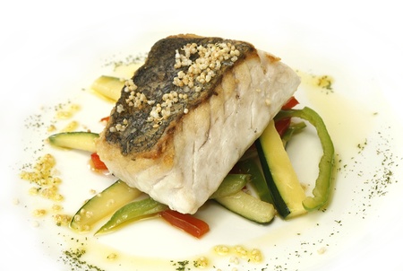 Roast hake with vegetablesの写真素材