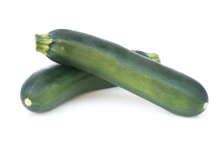fresh zucchini on white backgroundの写真素材