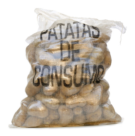 A sack of potatoes on white backgroundの写真素材