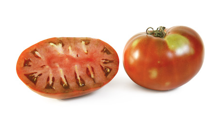 still life with two tomatoes on white backgroundの写真素材