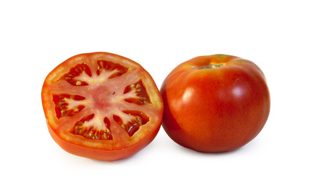 still life with two tomatoes on white backgroundの写真素材