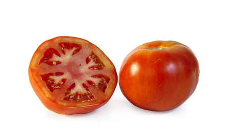 still life with two tomatoes on white backgroundの写真素材