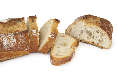 bread baked in a traditional oven and sliced ??bread ??の写真素材