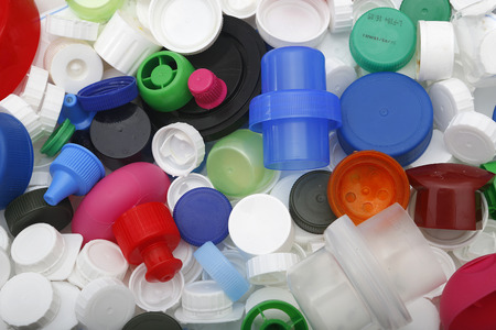 colored plastic caps ready to be recycled. Symbol of solidarityの写真素材