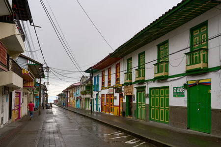 Filandia, QuindÃ­o Colombia - September 16, 2022. The streets and beautiful bahareque houses with colorful doors. Colonial and bahareque architecture. horizontal.のeditorial素材