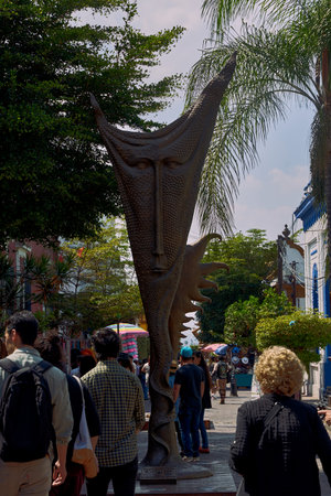 Tlaquepaque, Jalisco, Mexico - April 21, 2023: Sunrise and sunset artwork by artist Sergio Bustamante. Bronze sculpture in the street of Tlaquepaque.のeditorial素材