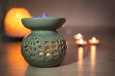 Aroma Lamp With Burning Candle. Aromatherapy. Essential Oil. Spa Room. romantic atmosphere of a...