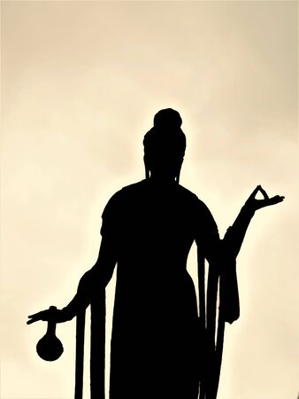 Japanese woman statue black silhouette in a cemeteryの写真素材