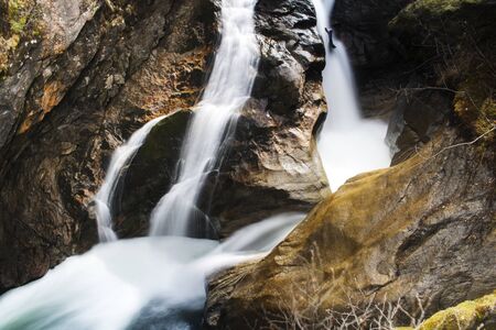 Beautiful landscape showing Krimmler waterfall in a rocky mountain in Austria in long exposure...