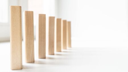 wooden blocks stand vertically one after another - photoの写真素材