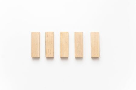 wooden bars lie on a light background - photoの写真素材