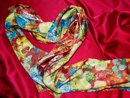 floral silk on a red silkの写真素材