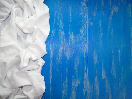 white fabric on blue backgroundの写真素材