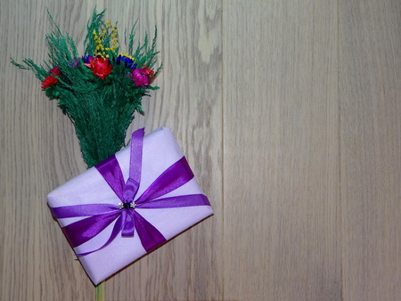 bouquet of flowers and a giftの写真素材