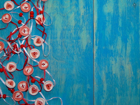 buttons with heart on blue backgroundの写真素材