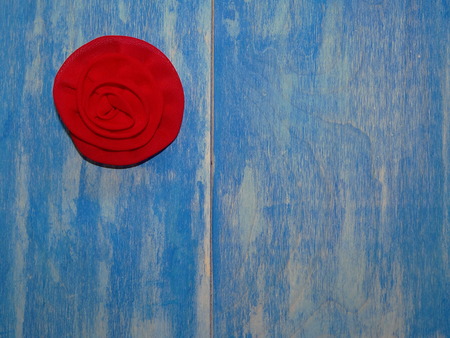 artificial flower on a blue background