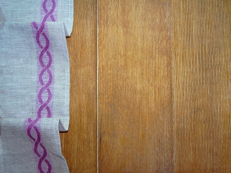 grey cloth over wooden boardsの写真素材
