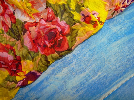 colored cloth on the blue wooden boardsの写真素材