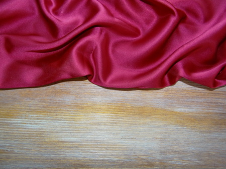 red silk over wooden boardsの写真素材