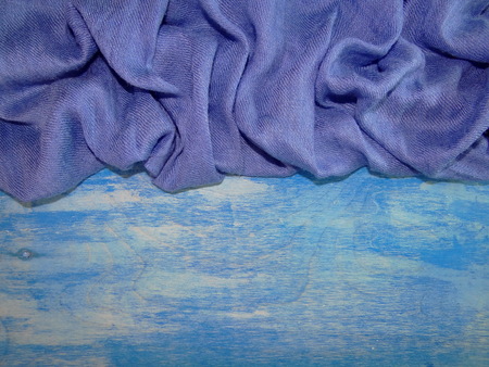 blue cloth on blue wooden boards