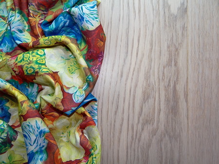 colorful fabric on the wooden planksの写真素材