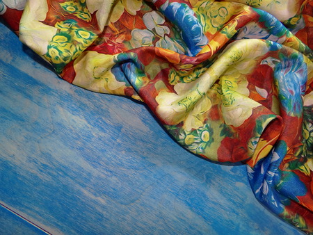 colorful fabric on the wooden planksの写真素材