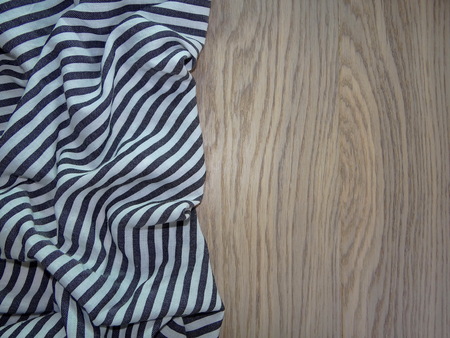 striped fabric on wooden boardsの写真素材