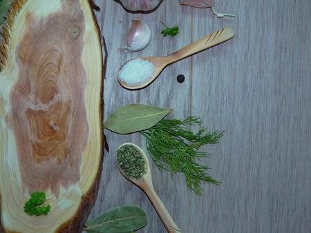 wooden Board with spicesの写真素材