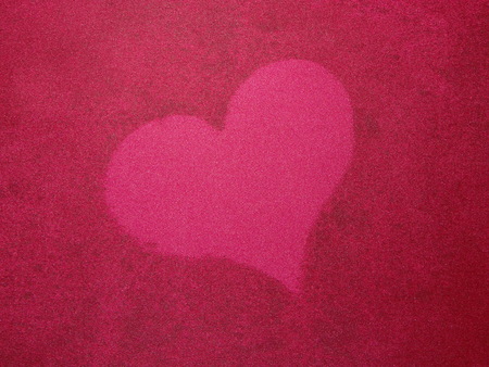 heart on red silkの写真素材