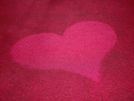 heart on red silkの写真素材
