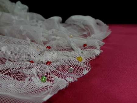 white lace and needlesの写真素材