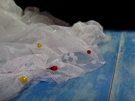 white lace with needles