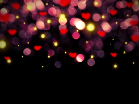 flare and hearts on a black backgroundの写真素材