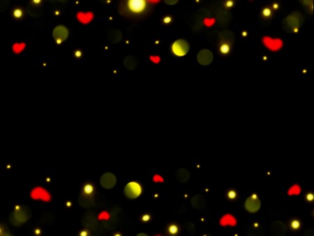 flare and hearts on a black backgroundの写真素材